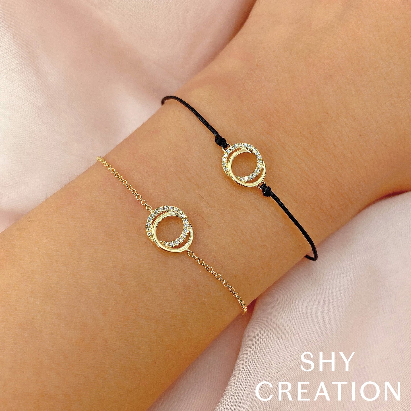 0.07CT 14K W/G DIAMOND LOVE KNOT CIRCLE BRACELET