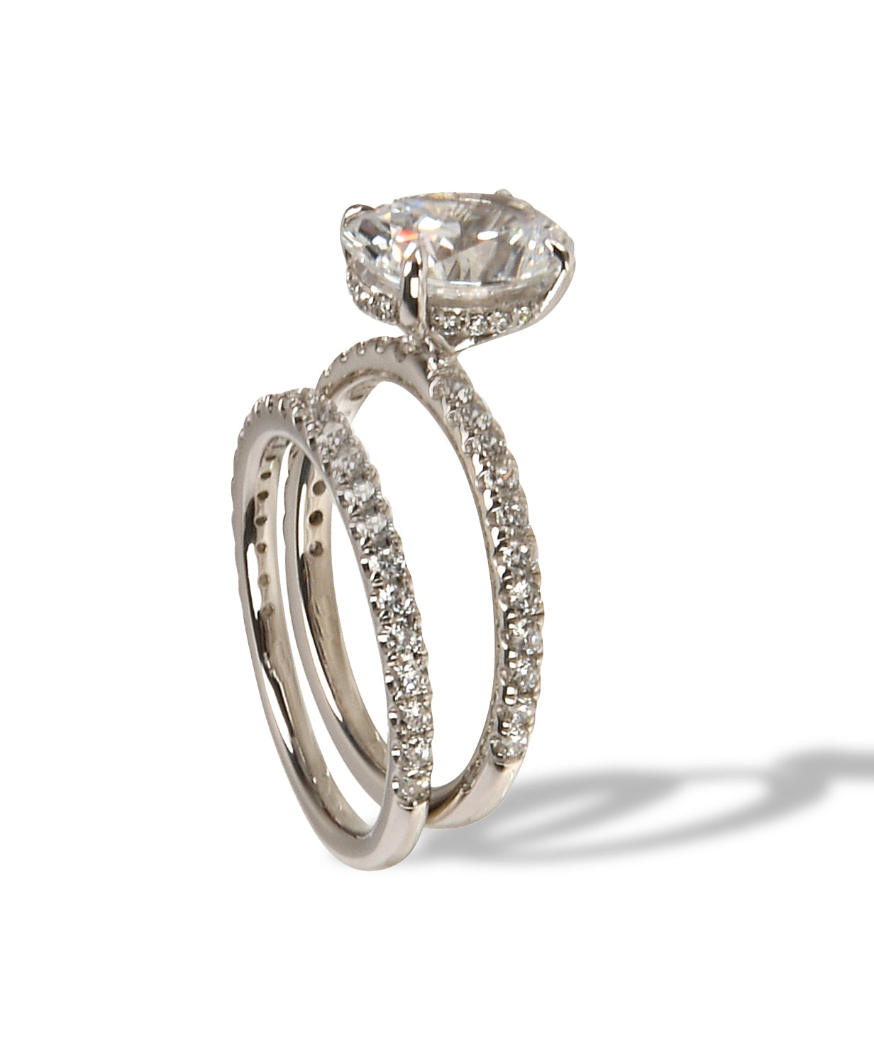 Oval Halo Engagement Ring & Pavé Wedding Band Set